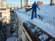 Уборка  снега  с  крыш